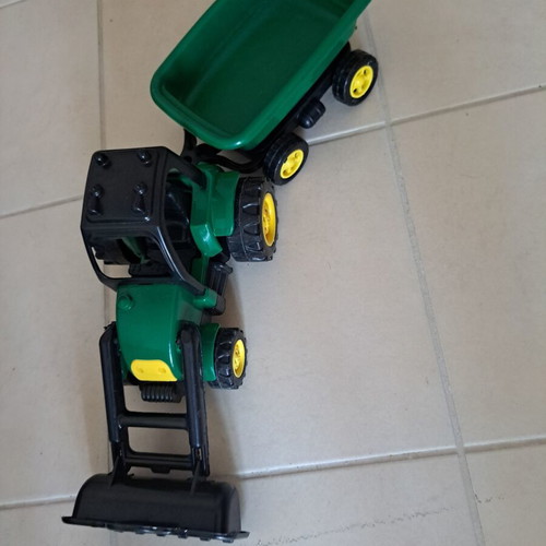 Plastic toy tractor with excavator and detachable trailer
