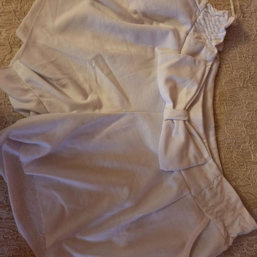 So Sexy white shorts medium used with bow and pockets