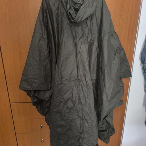 Military poncho used with all buttons functional