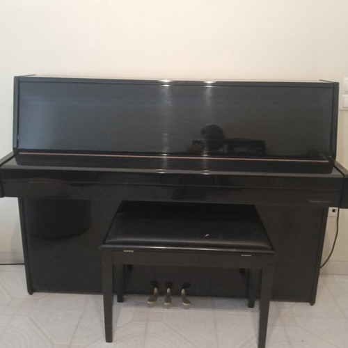 Eterna Yamaha upright piano like new with storage bench