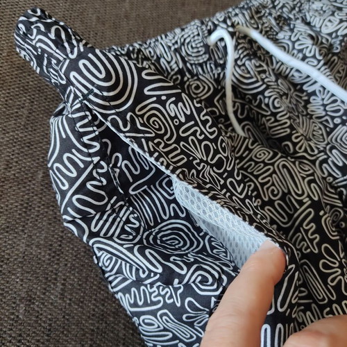 Men's swim shorts 2XL like new, black with white patterns