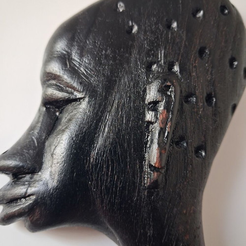 African wooden wall heads set of two used, black, hanging
