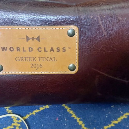 Pucca World Class δερμάτινη τσάντα χειρός με μεταλλικό στόμιο