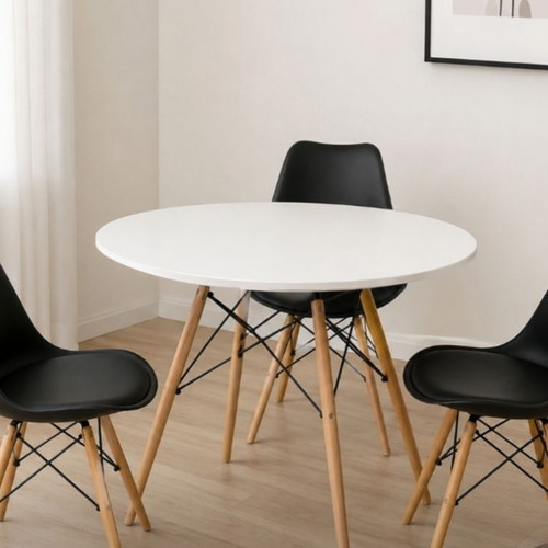 Dining set with white table and three black chairs