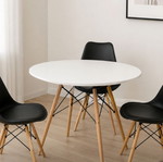 Dining set with white table and three black chairs