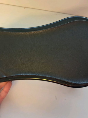 Office armrest base used, black plastic