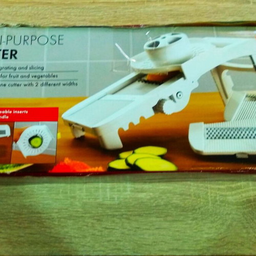 Multi-Purpose Grater new with accessories for slicing and shredding