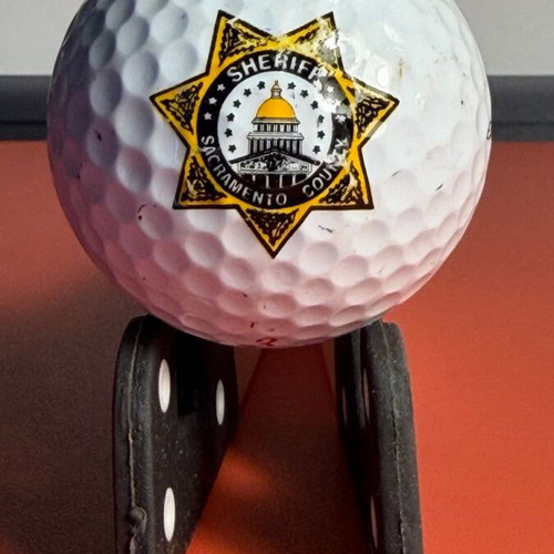 Top Flite XL 2000 Extra Long golf ball used with Sacramento County Sheriff logo