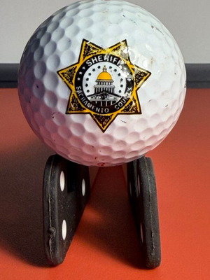 Top Flite XL 2000 Extra Long golf ball used with Sacramento County Sheriff logo
