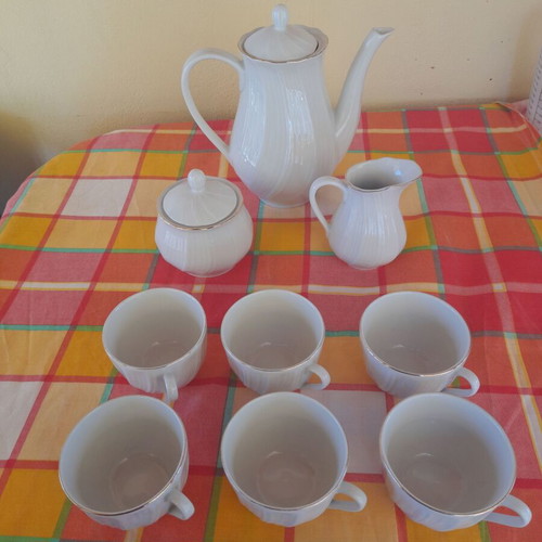 Porcelain tea set 9 pieces used, classic elegant design