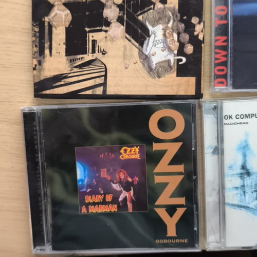 Ozzy Osbourne and Radiohead CD set like new, 5 CDs