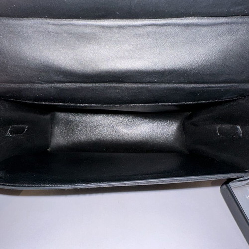 Leather handbag like new, black with shoulder strap and sanitizer bottle