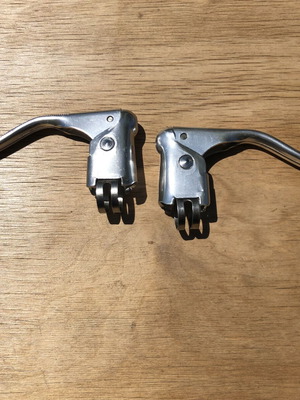 Vintage brake levers pair new old stock