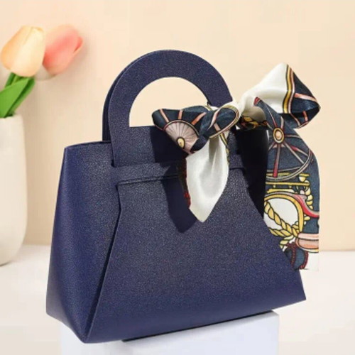 Gift packaging bag made of artificial leather new, blue with ribbon