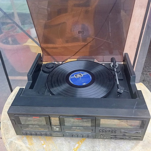 Stereo system with turntable, radio and 2 cassette players used