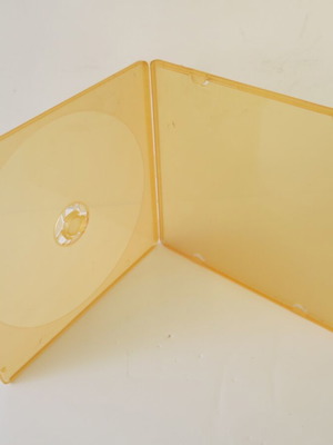 CD/DVD slim case orange like new, one-piece clamshell