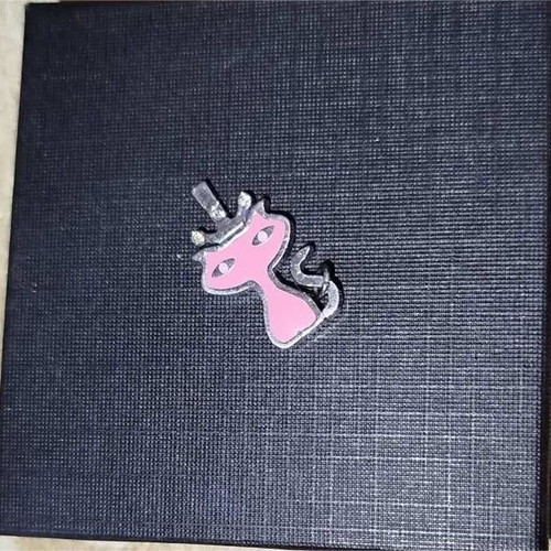 Children's cat pendant like new, steel with pink enamel