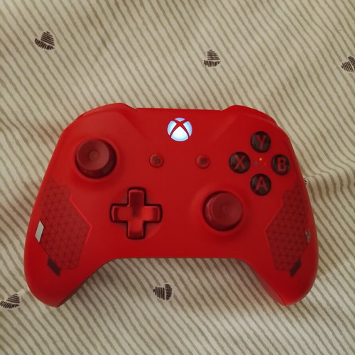 Xbox One console like new with 1TB storage and extra black controller