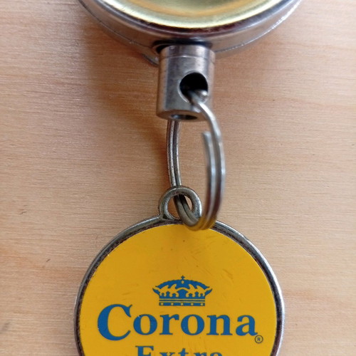 Corona Extra keychain bottle opener used with retractable strap