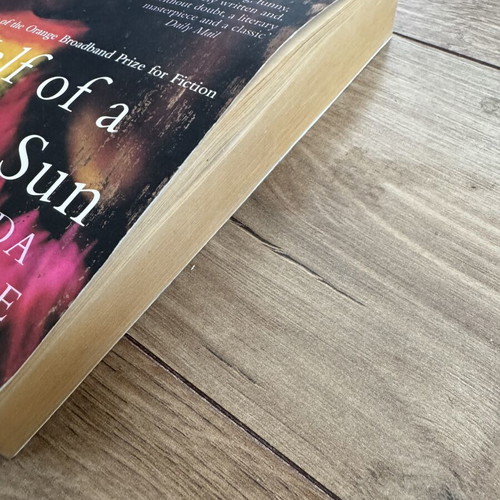 Half of a Yellow Sun by Chimamanda Ngozi Adichie used fiction book