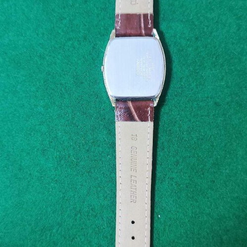 Orient VX wristwatch like new, gold color, leather strap