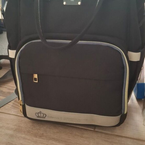 Lequeen Backpack Diaper Bag Black like new with changing mat and bottle warmer