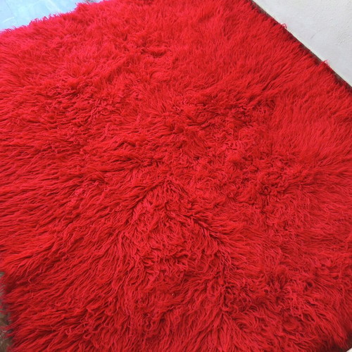 Red flokati rugs used, large pieces, pack of 2
