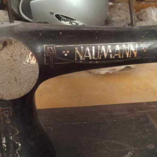 Naumann Hand Sewing Machine used on wooden antique base