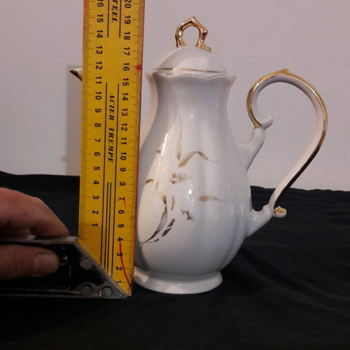 Vintage porcelain teapot and sugar bowl set like new