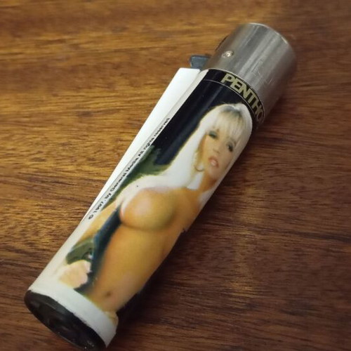 Clipper lighter like new with Penthouse logo and vintage design