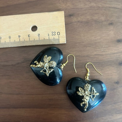 Vintage heart-shaped dangling earrings with embossed angels like new