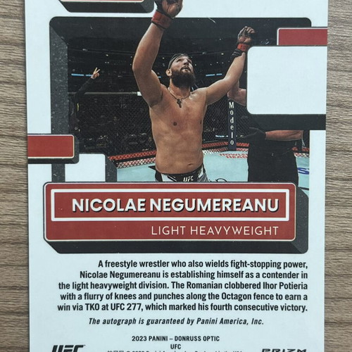 2023 Panini Donruss Optic UFC Rated Rookie Nicolae Negumereanu Silver Prizm Autograph Card like new