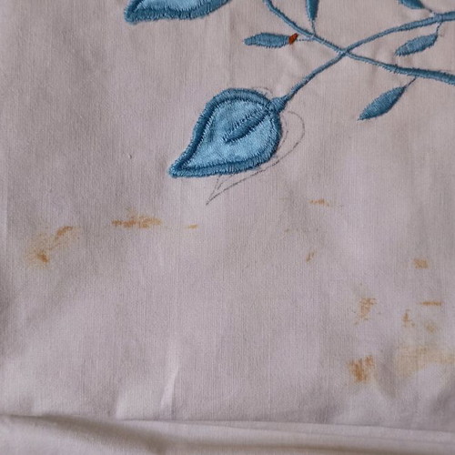 Vintage cotton bed sheets with blue satin appliqué pattern and pillowcases like new