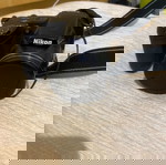  Nikon φωτογραφική μηχανή δίνεται μαζί και φορτιστής με 4 μπαταρίες επαναφόρτισης  και θήκη μεταφοράς