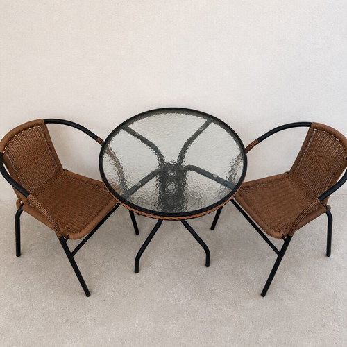 Outdoor table set with 2 chairs used, metal frame and glass top