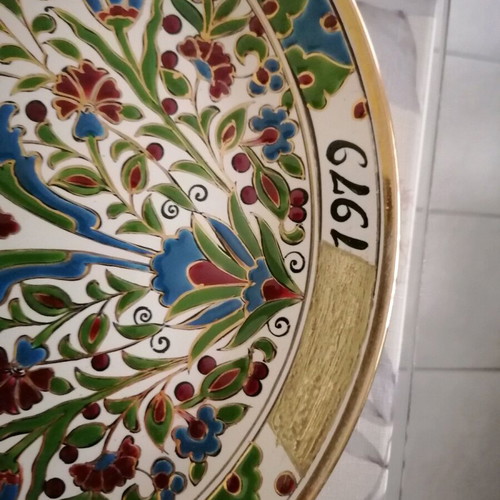 Ceramic wall plate used with gold details
