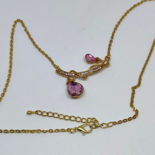 Pendant with pink crystals and gold chain like new