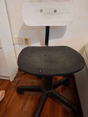 IKEA office chair used with slightly torn fabric and missing head cushion