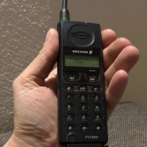 Ericsson 388 used, black, works with charger only