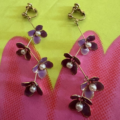 Elegant earrings with purple flowers and pearls