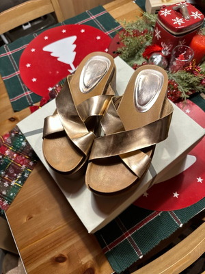 Gold flatforms used with thick treaded sole and wide straps