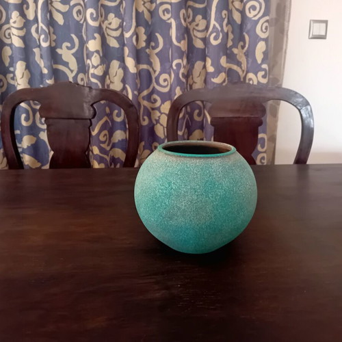 Clay vase round shape in blue-green shade like new