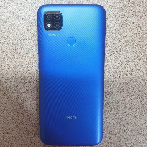 Redmi 9C smartphone with scratch-free screen, blue