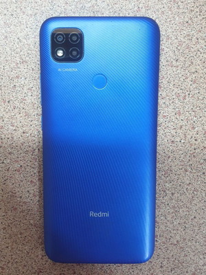 Redmi 9C smartphone with scratch-free screen, blue
