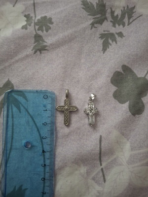 Two small cross pendants