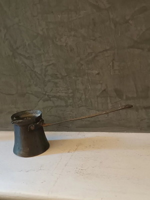 Bronze coffee briki used with steel handle