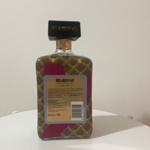 Disaronno collectible bottle used, Disaronno Wears Trussardi