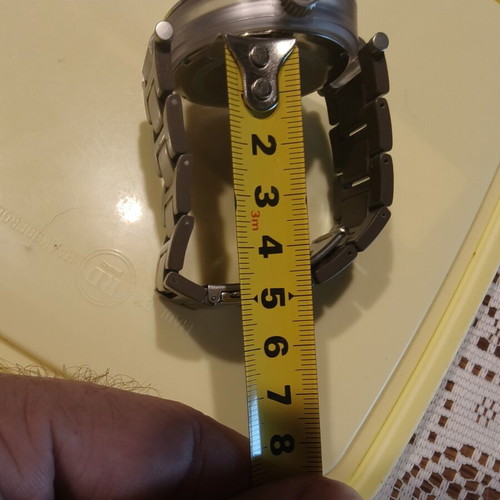 IKI Men's Quartz Watch with Brown Dial and Roman Numerals