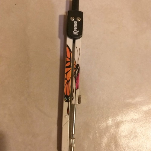 Compass like new with butterfly design
