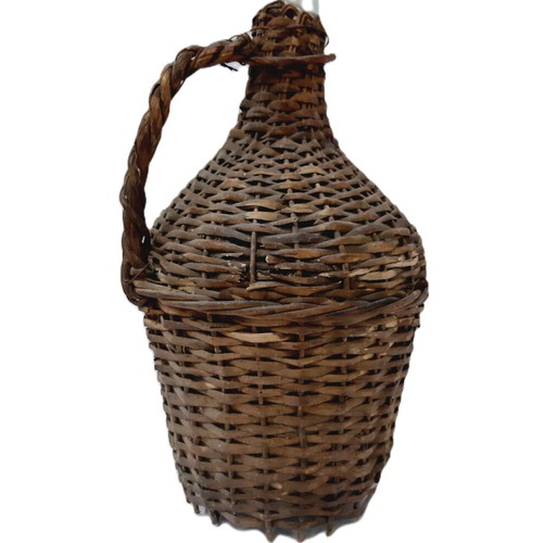 Dame-Jeanne vintage demijohn bottle used, glass with wicker